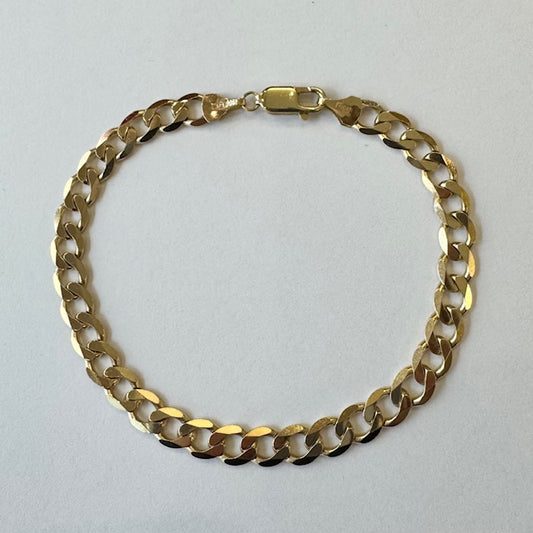 PLB19 9ct Y/G Flat curb link bracelet 10.4grms £935 81/2 inches length